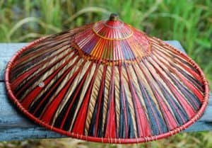 Red and straw colored hat