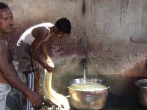 Rinsing dyed fabric in India